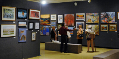 Group of people taking a talking tour at the Lambton Heritage Museum