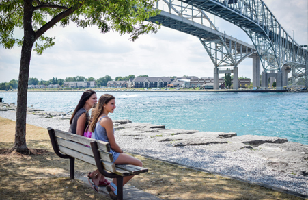 two women sitting by the Bluewater Bridge
